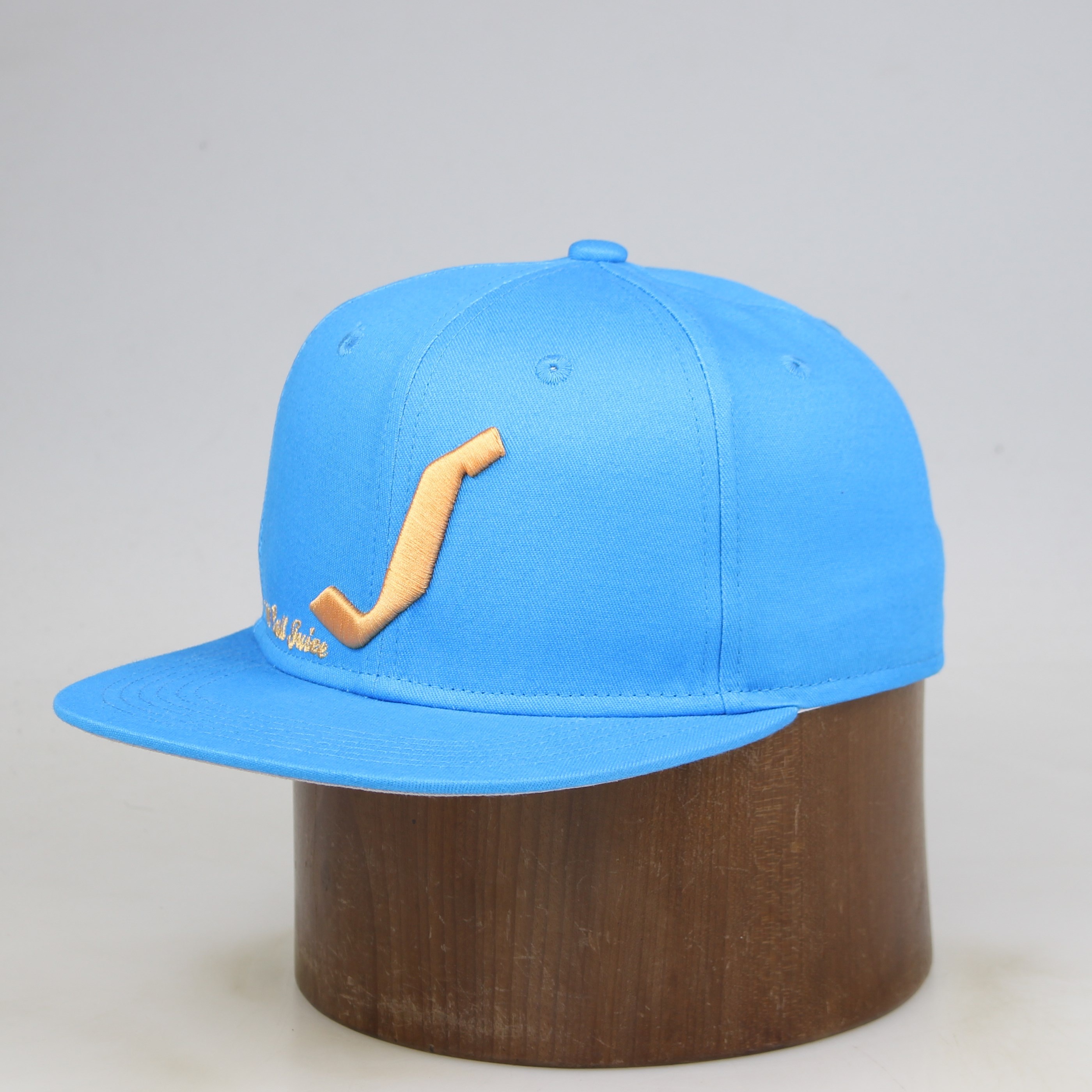 Sky Blue Flat-Brim Six-Panel Snapback with Gold Curved-Logo Embroidery