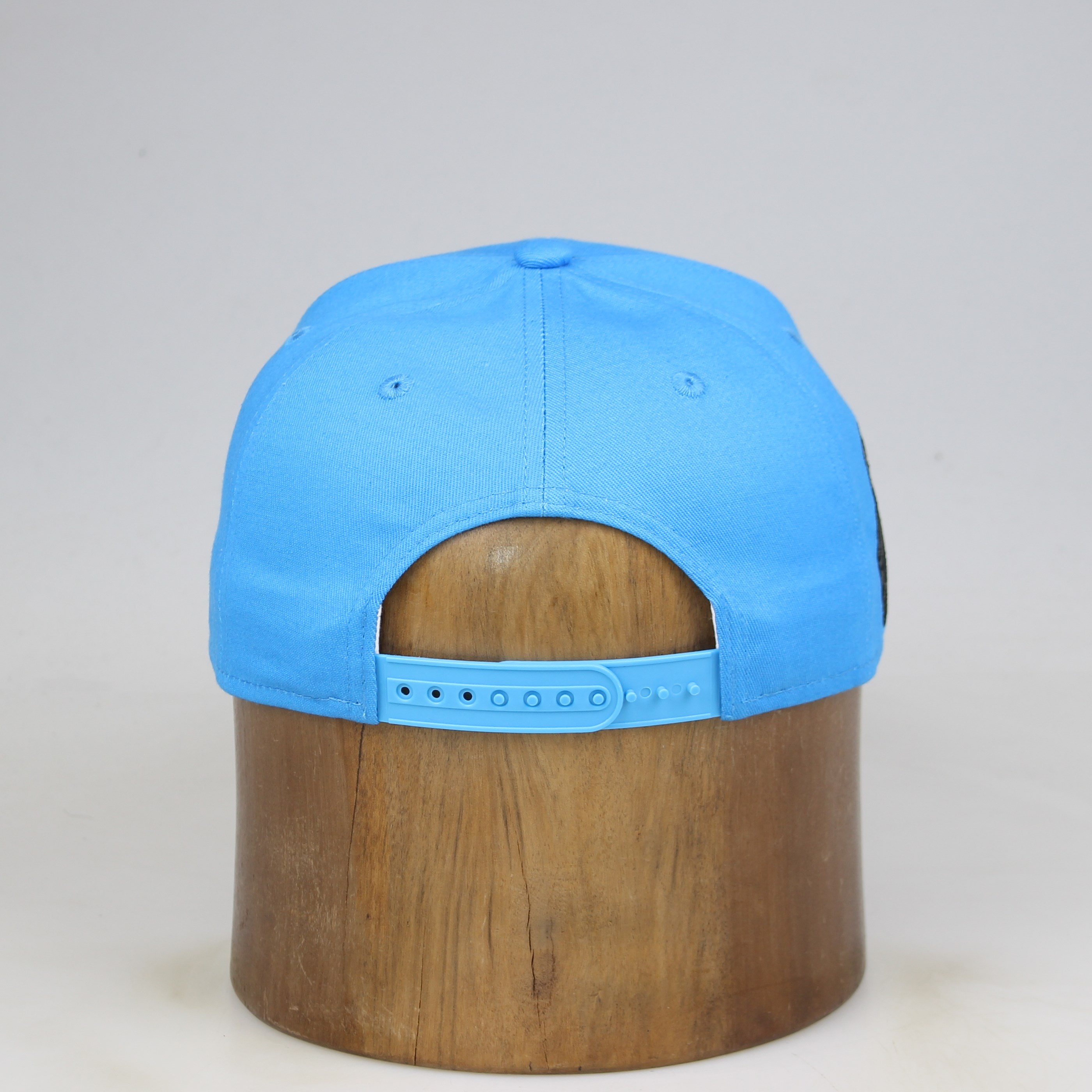 Sky Blue Flat-Brim Six-Panel Snapback with Gold Curved-Logo Embroidery