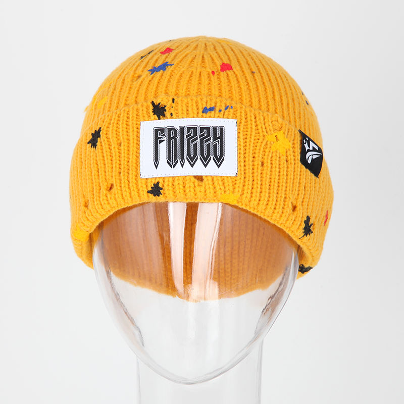 Mustard Yellow Rib-Knit Cuffed Beanie with Paint-Splatter Accents and Woven Patch