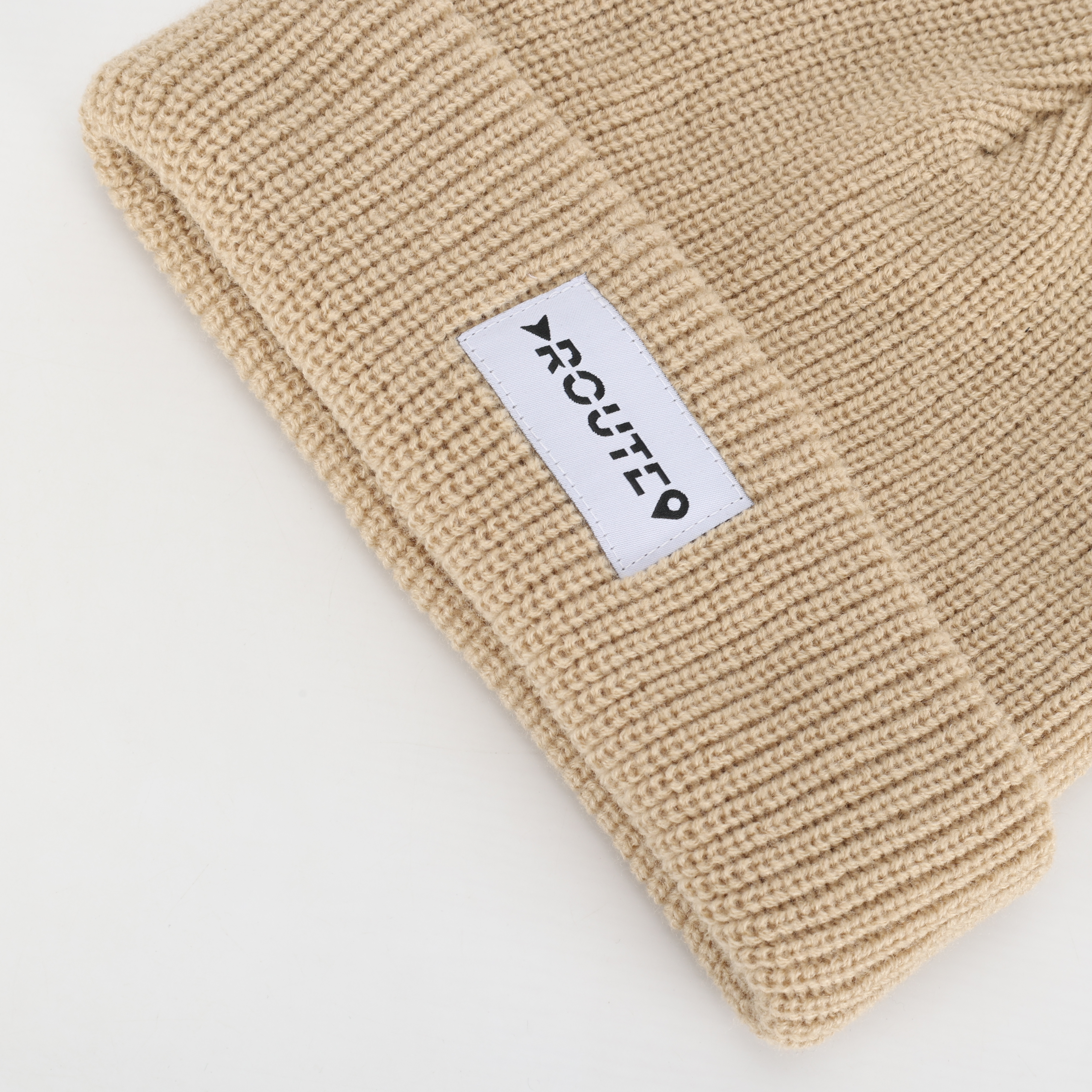 Beige Ribbed Knit Beanie with Woven Patch Label