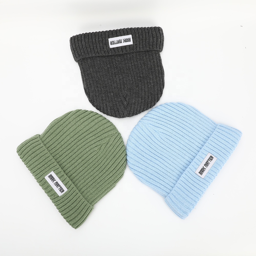 Ribbed Knit Cuffed Beanie with Woven Front Label – Solid Color Winter Hat