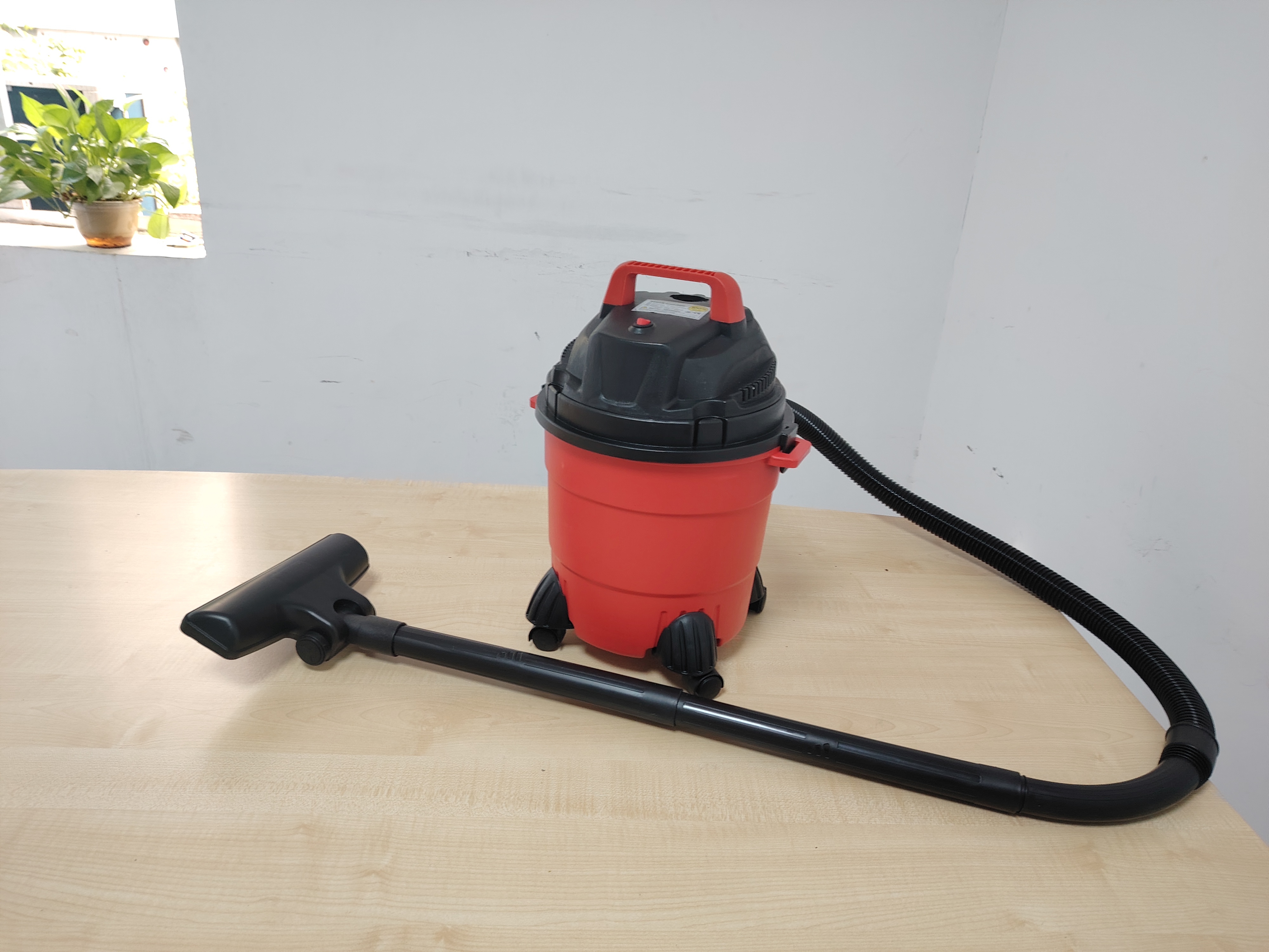 Compact Wet and Dry Utility Vacuum Cleaner with Portable Design for Garage and Car Cleaning