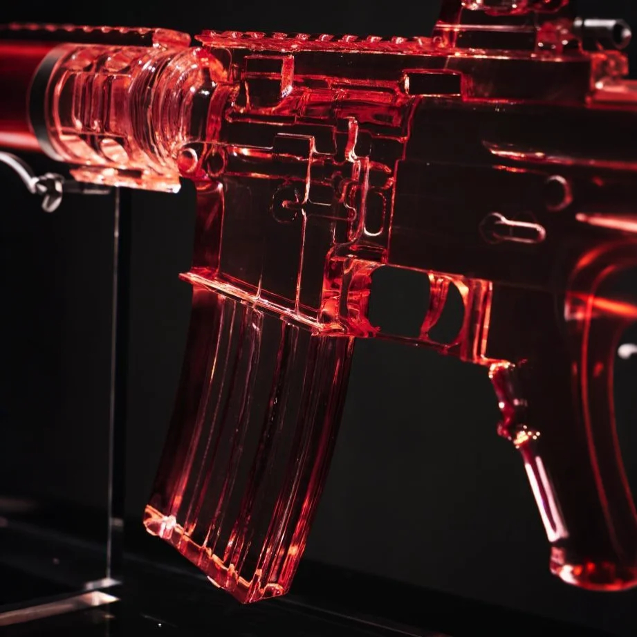 Luminous Ember Acrylic Sculpture (Gun)