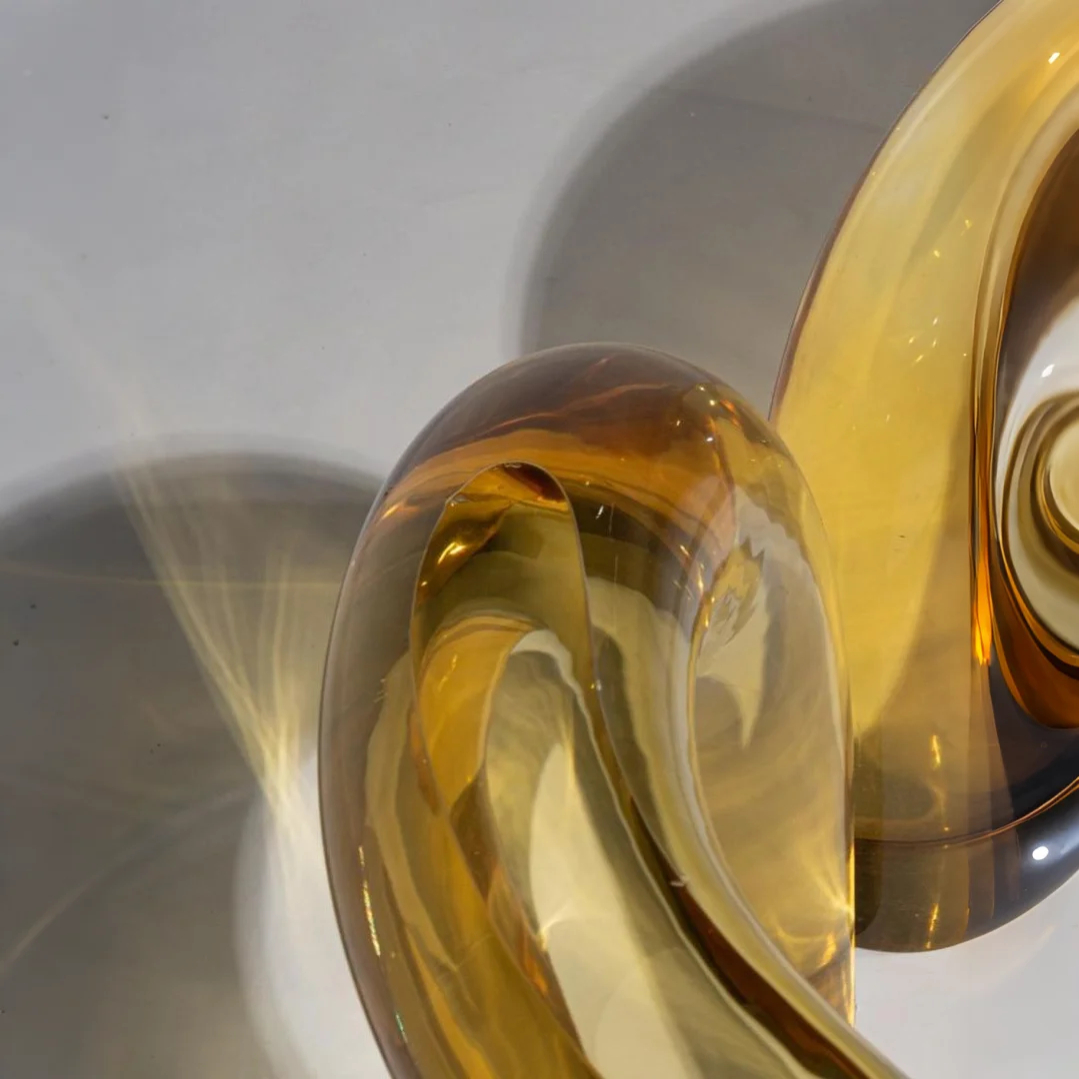 Amber Curved Acrylic Coffee Table