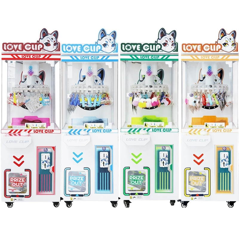 Children's claw machine, mini , large commercial mall style, for grabbing snacks, figurines, pendants, and plush toys.