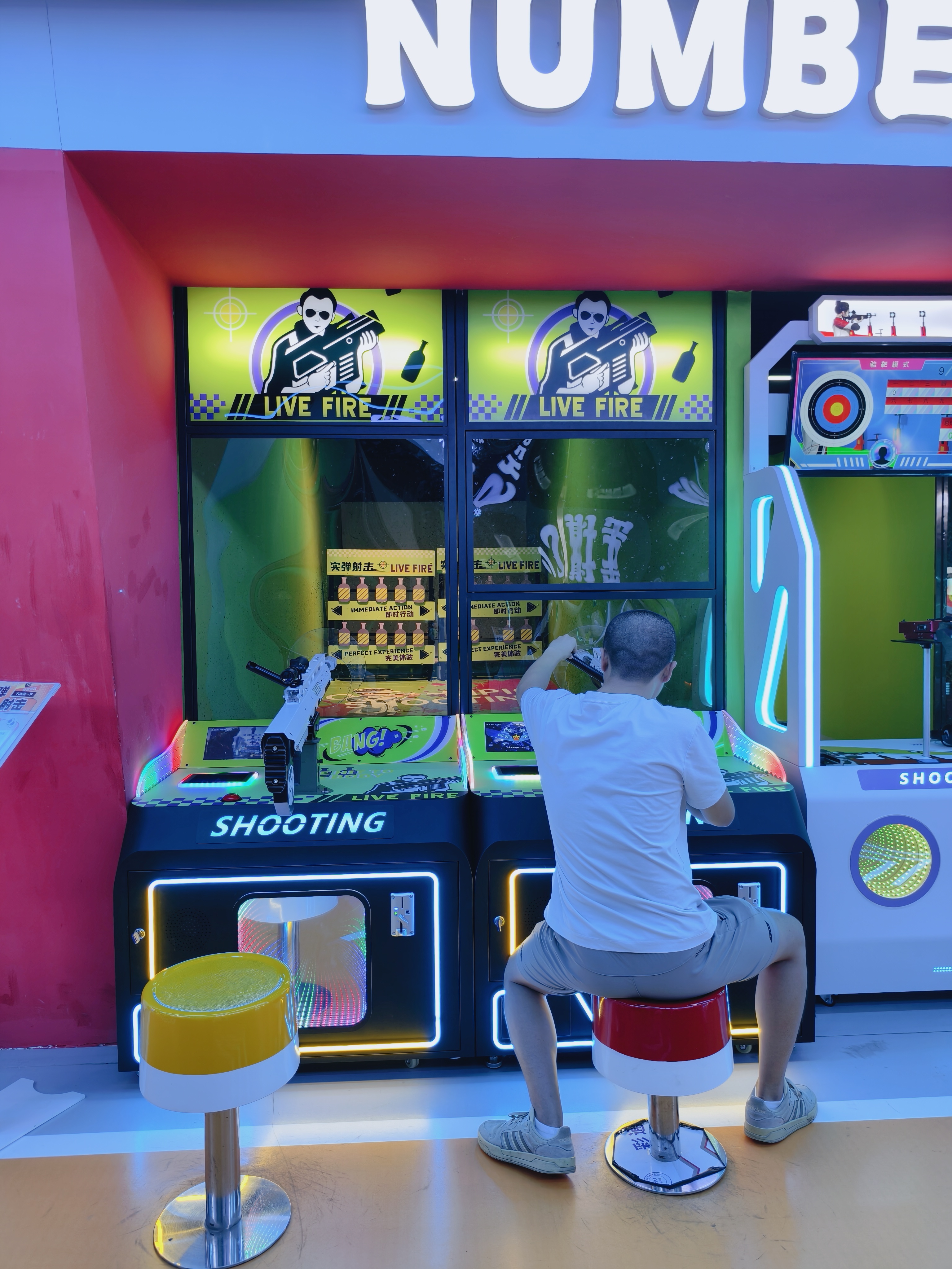 New Trendy Game Center Offers Live-fire Shooting Games - Games Where Players Use Real Guns to Shoot at Targets for Fun.