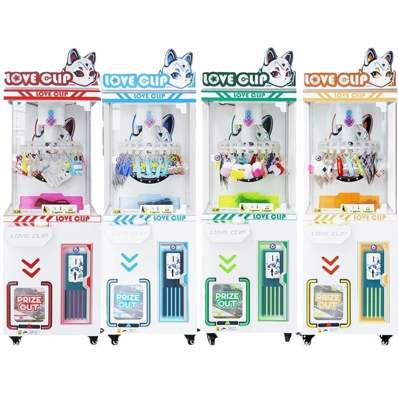 Children's claw machine, mini , large commercial mall style, for grabbing snacks, figurines, pendants, and plush toys.