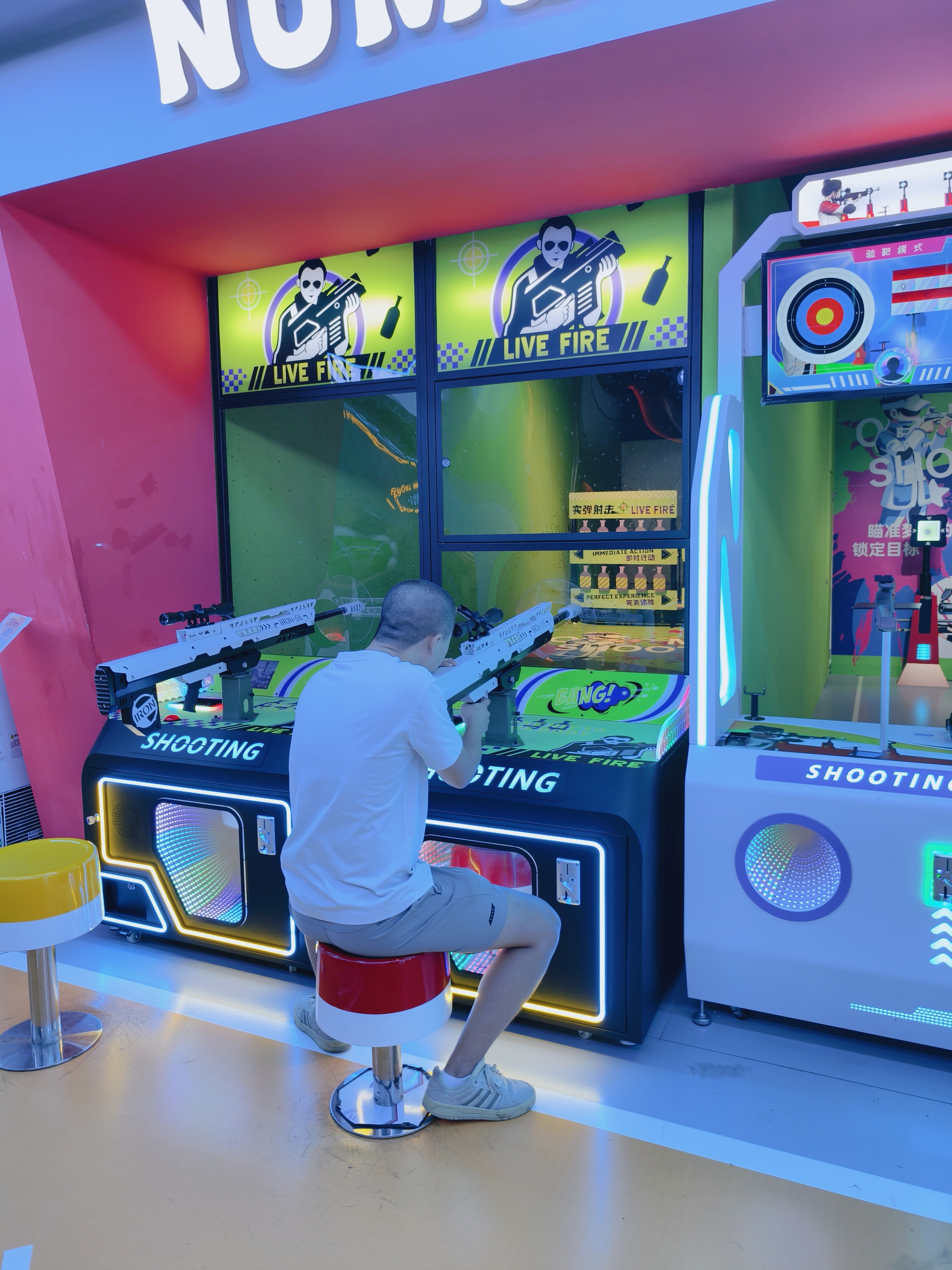 New Trendy Game Center Offers Live-fire Shooting Games - Games Where Players Use Real Guns to Shoot at Targets for Fun.