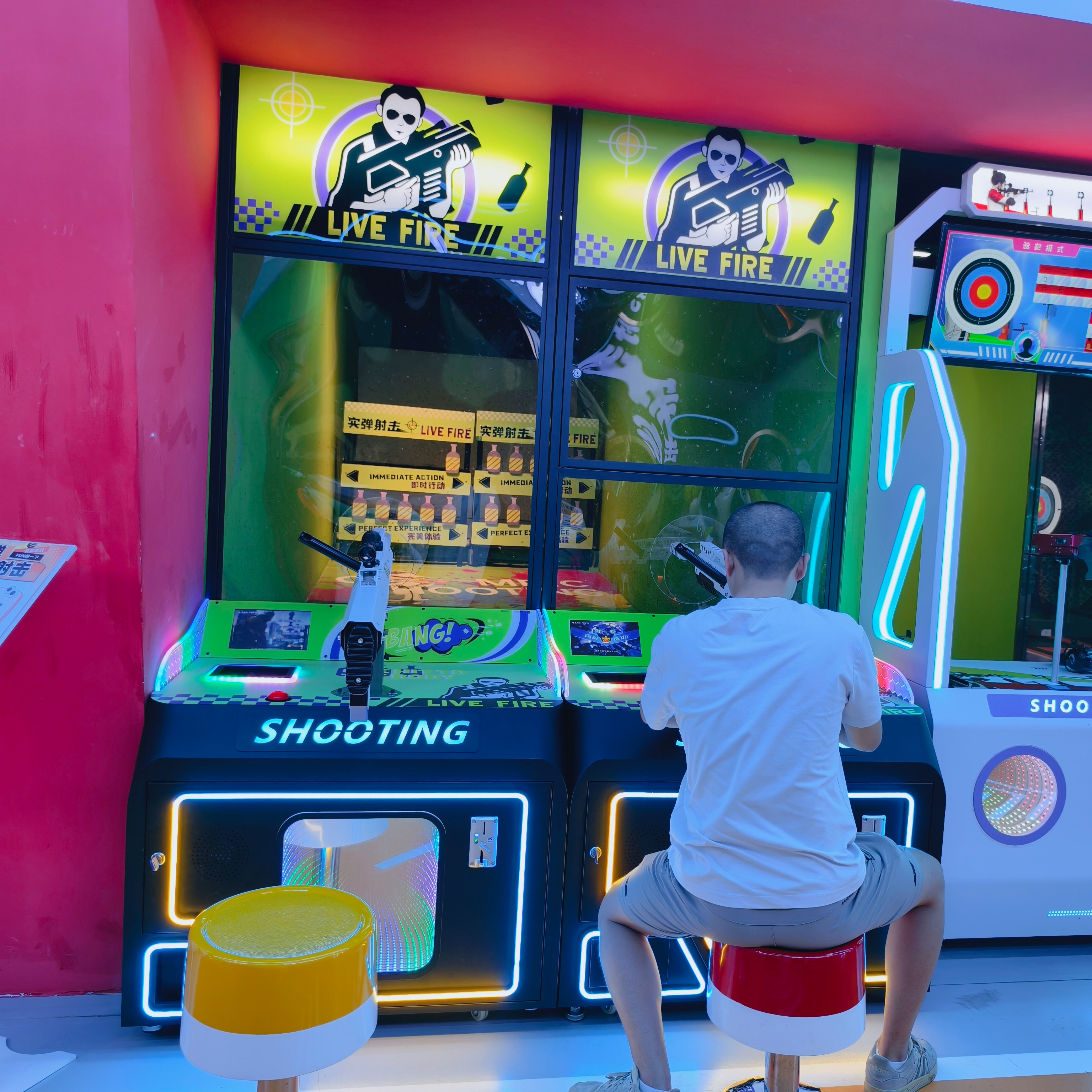 New Trendy Game Center Offers Live-fire Shooting Games - Games Where Players Use Real Guns to Shoot at Targets for Fun.
