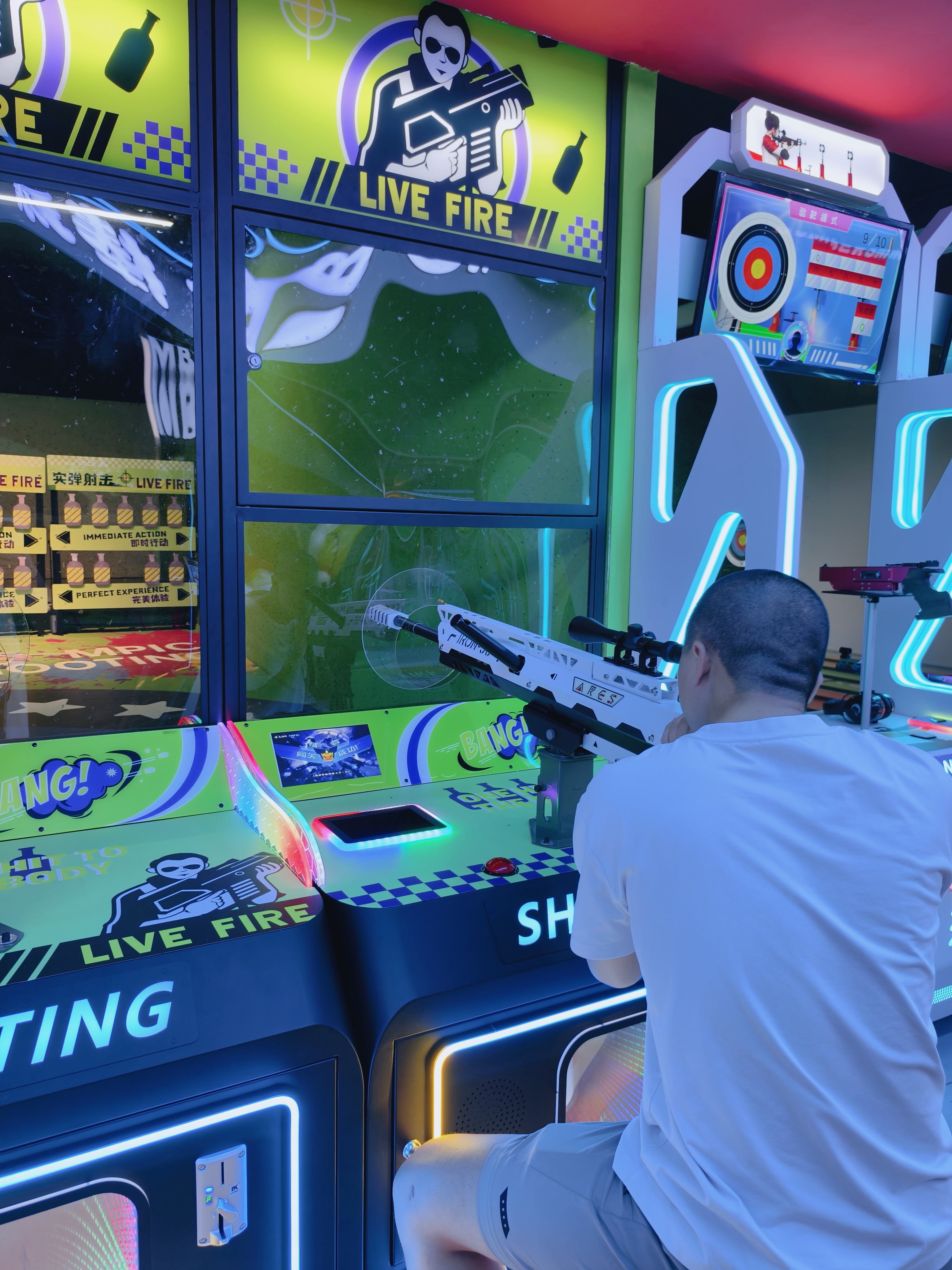 New Trendy Game Center Offers Live-fire Shooting Games - Games Where Players Use Real Guns to Shoot at Targets for Fun.