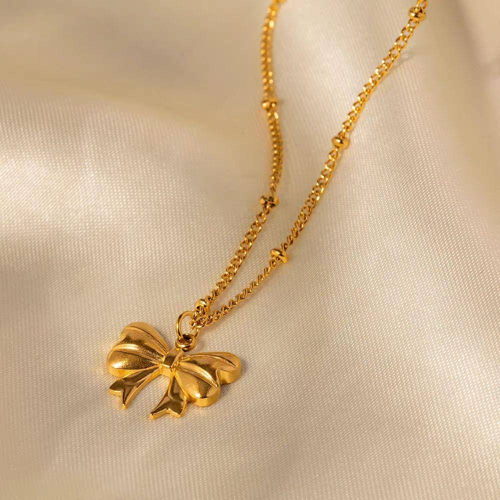 Charming Bow Knot Gold Necklace - Elegant Women's Jewelry