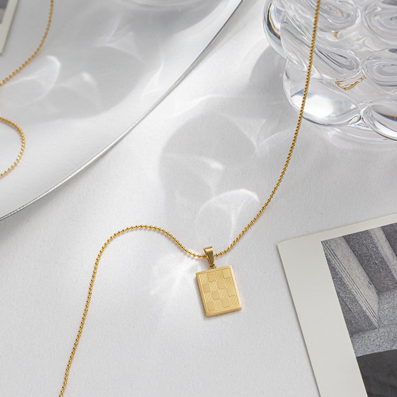 Gold Rectangular Checkerboard Pendant Necklace – Titanium Steel