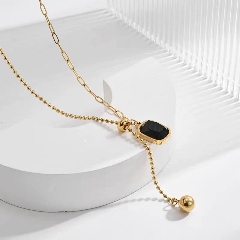Modern Gold Titanium Steel Necklace with Black Pendant and Asymmetric Chain Design