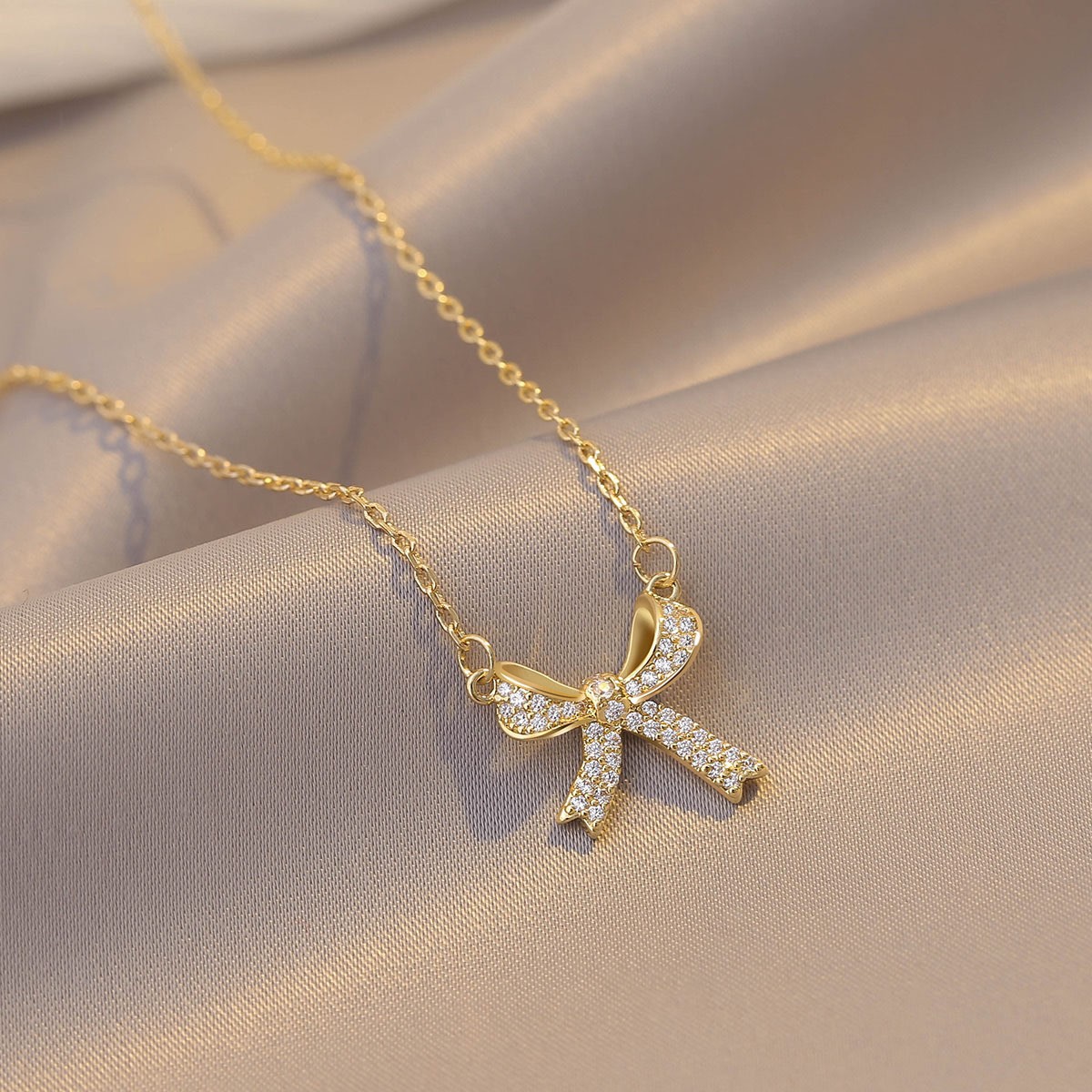 Gold Bow Titanium Steel Necklace for Women – Irregular Crystal Clavicle Chain