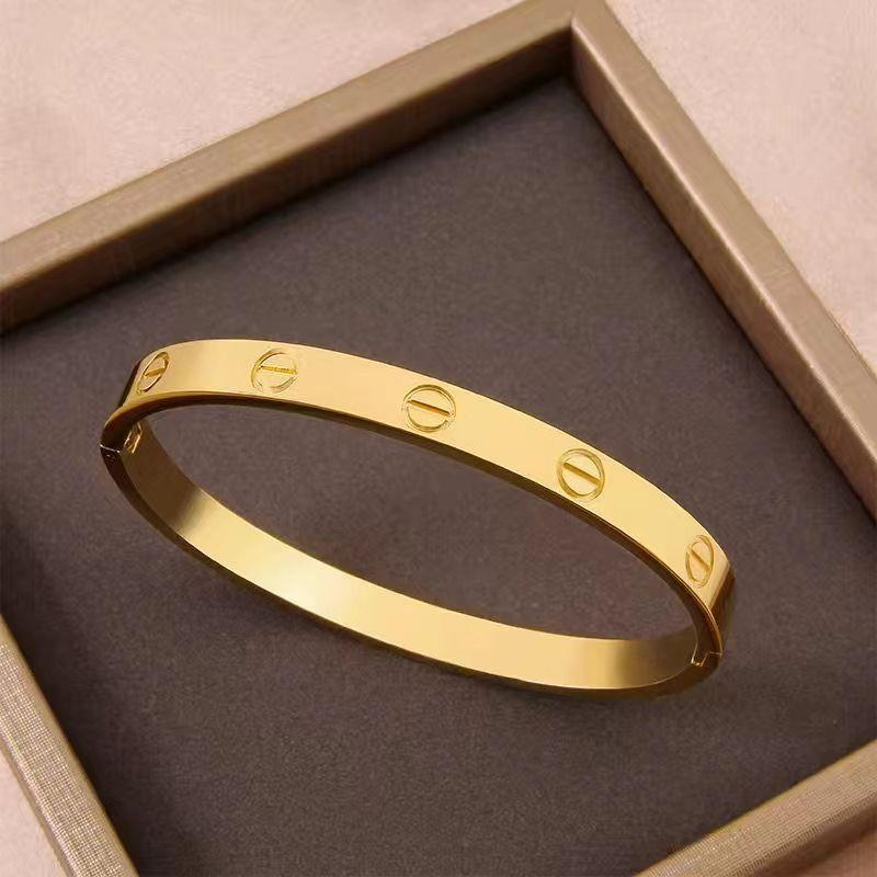 Gold Screw Motif Bangle Bracelet – Unisex Polished Iconic Jewelry