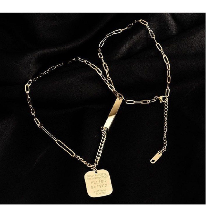 Gold Titanium Steel Tag Necklace with Engraved Text – Asymmetrical Chain Design