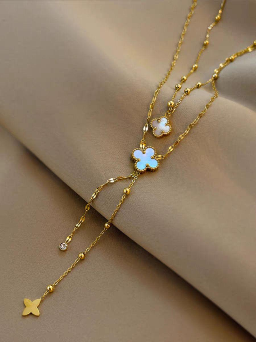 Layered Gold Clover Pendant Necklace – Elegant Multi-Strand Design