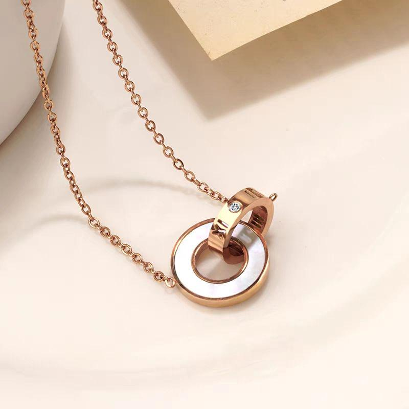 Rose Gold Interlocking Circle Pendant Necklace – Mother of Pearl & Crystal Accent