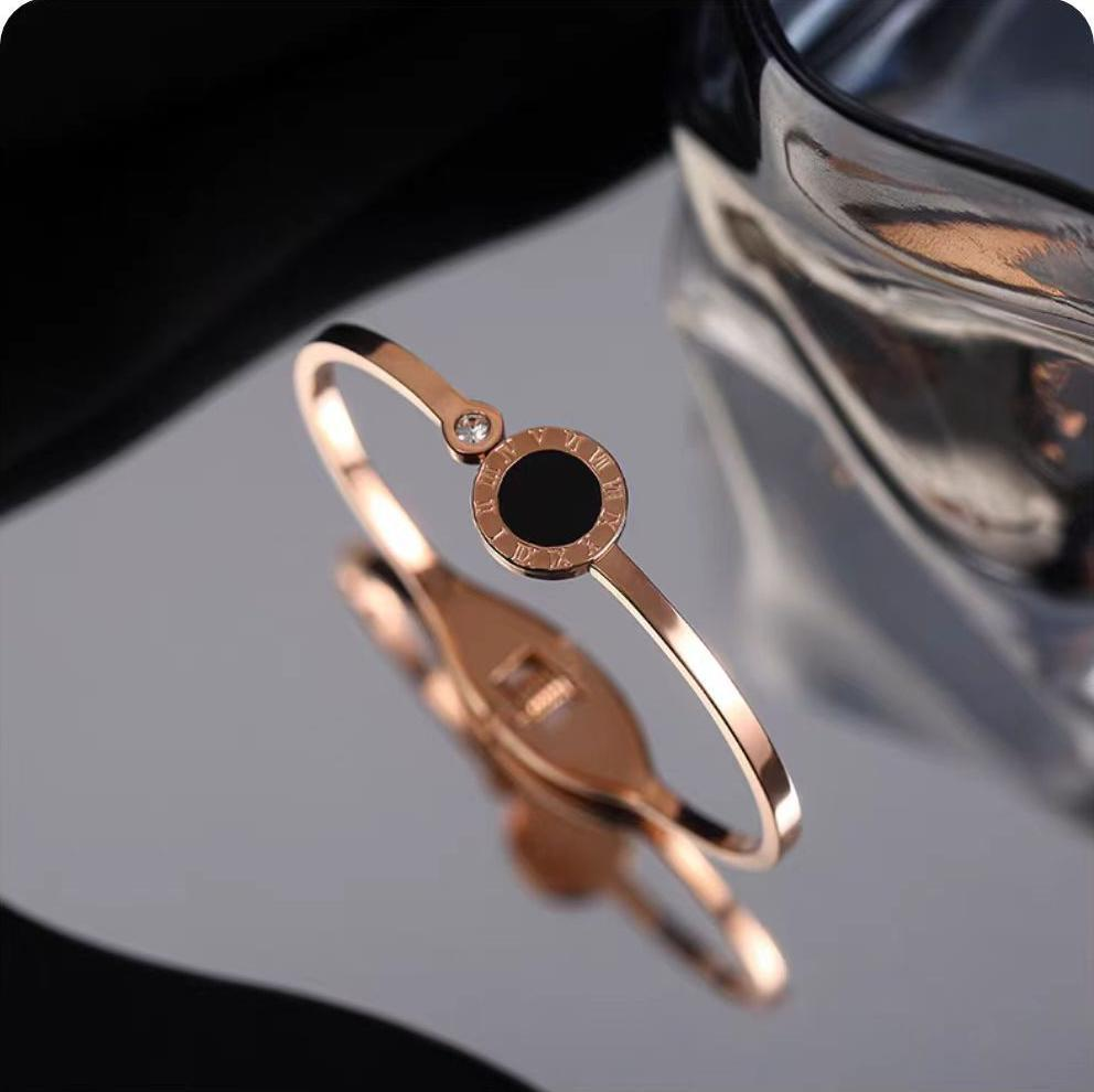 Rose Gold Stainless Steel Bangle Bracelet with Black Enamel Center & Crystal Accent – Geili Jewelry