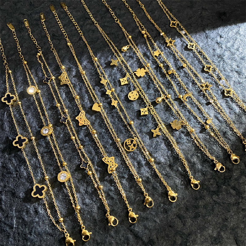 Women's High Quality Stainless Steel Adjustable 18K Gold-Plated Roman Numeral Butterfly Four Leaf Clover Fashion Charm Bracelet