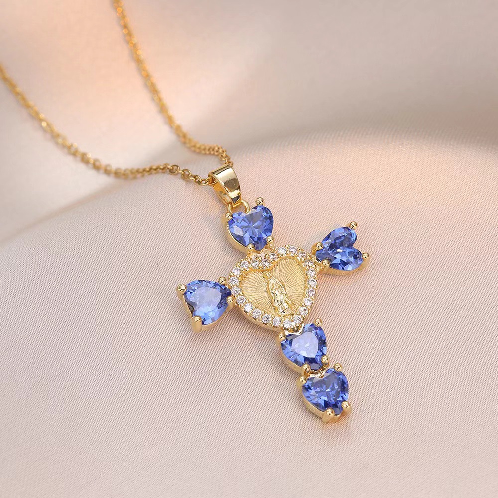 Gold Cross Necklace with Blue Heart Stones and Virgin Mary Medallion