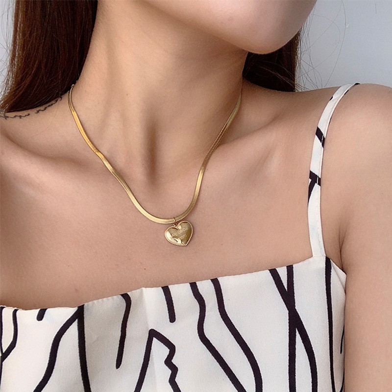 Romantic Gold Titanium Heart Necklace with &quotLove You More