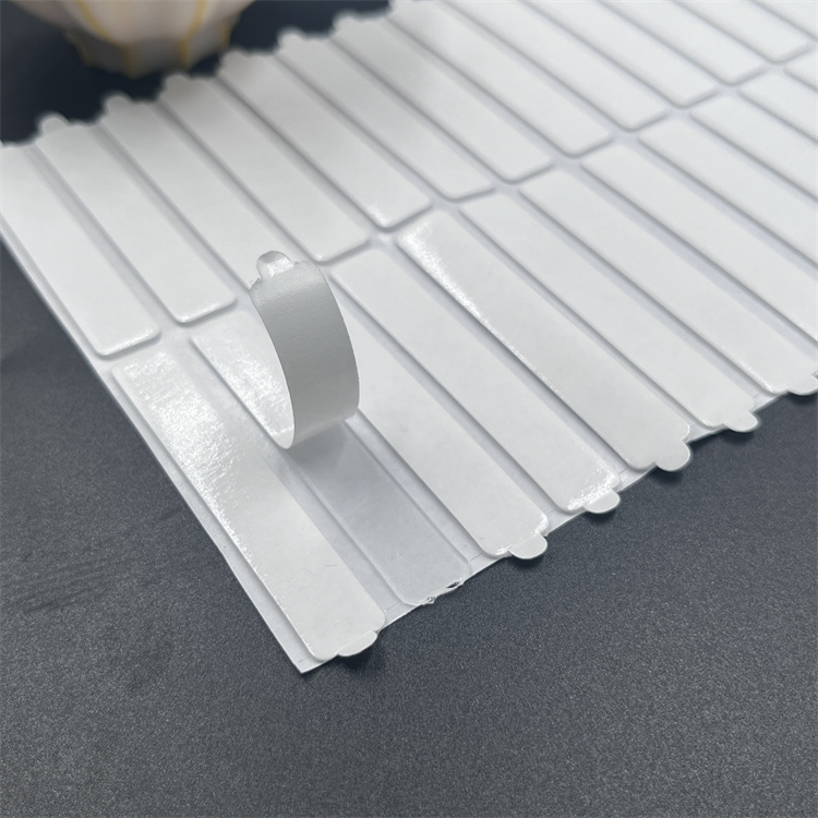 Die cut double sided tape with handle ba