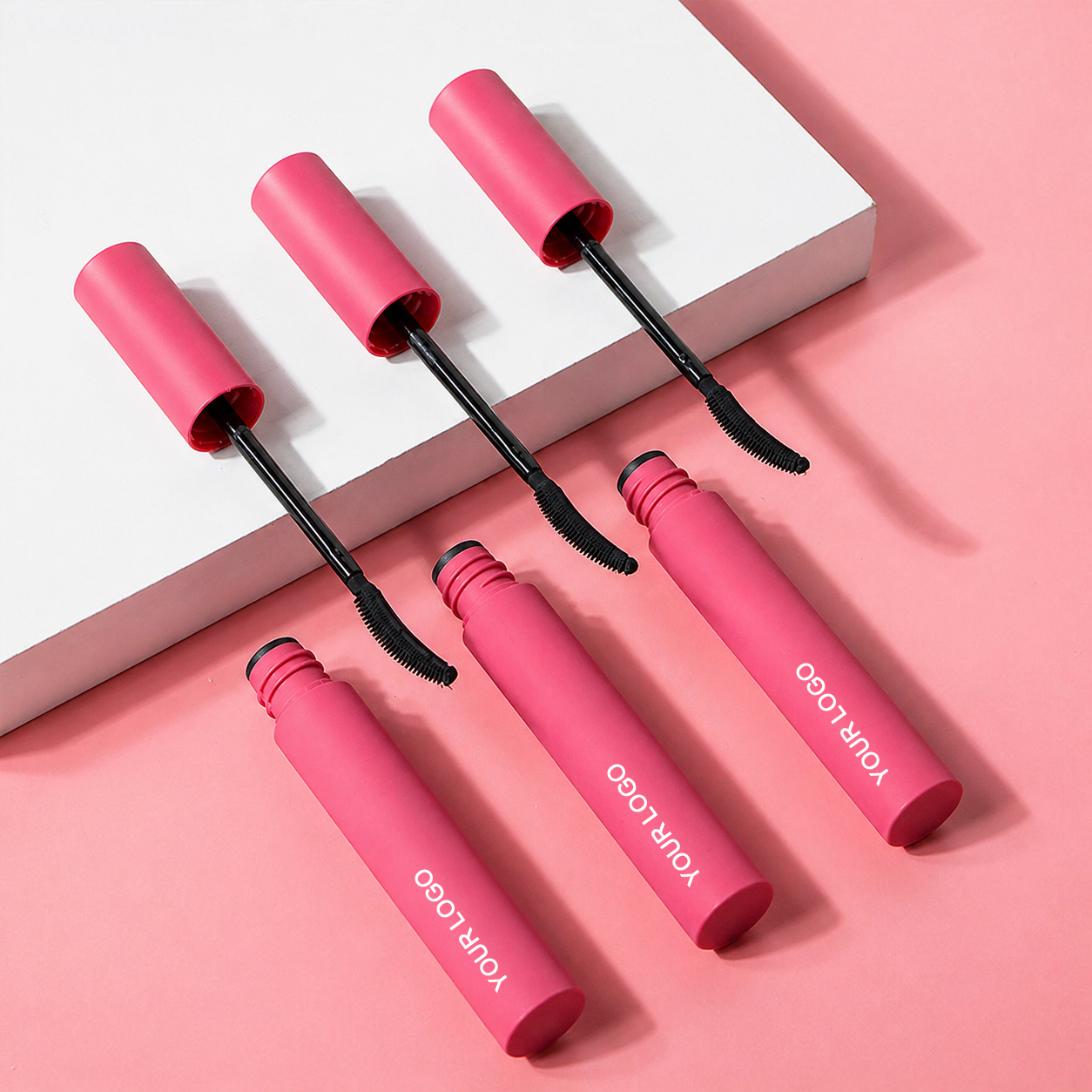 Curved Pink Mascara Tube – Ergonomic Brush for Volumizing & Defining Lashes