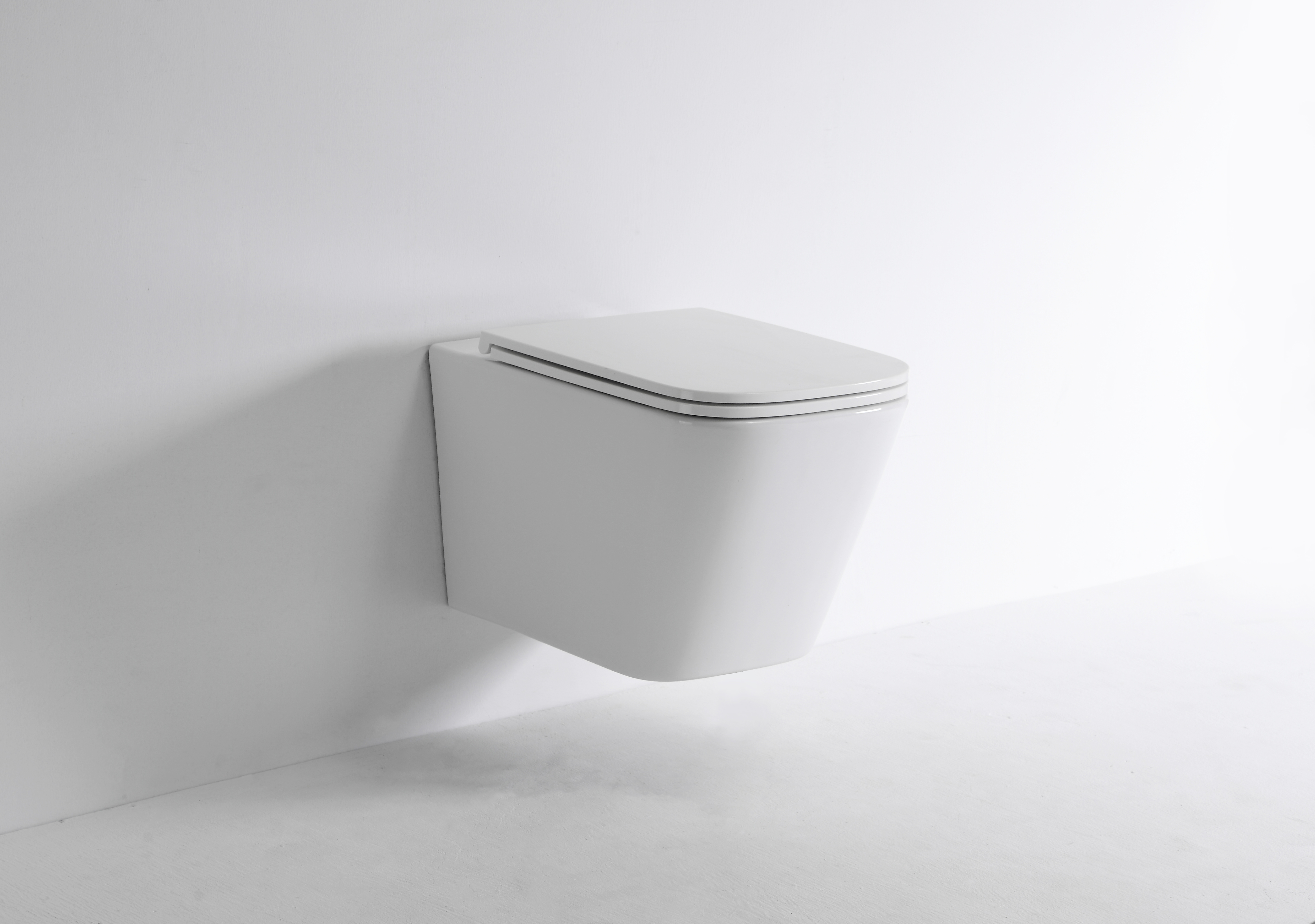 Væghængt Toilet | Model 2417E | Kompakt Rimless WC med Soft-Close Sæde