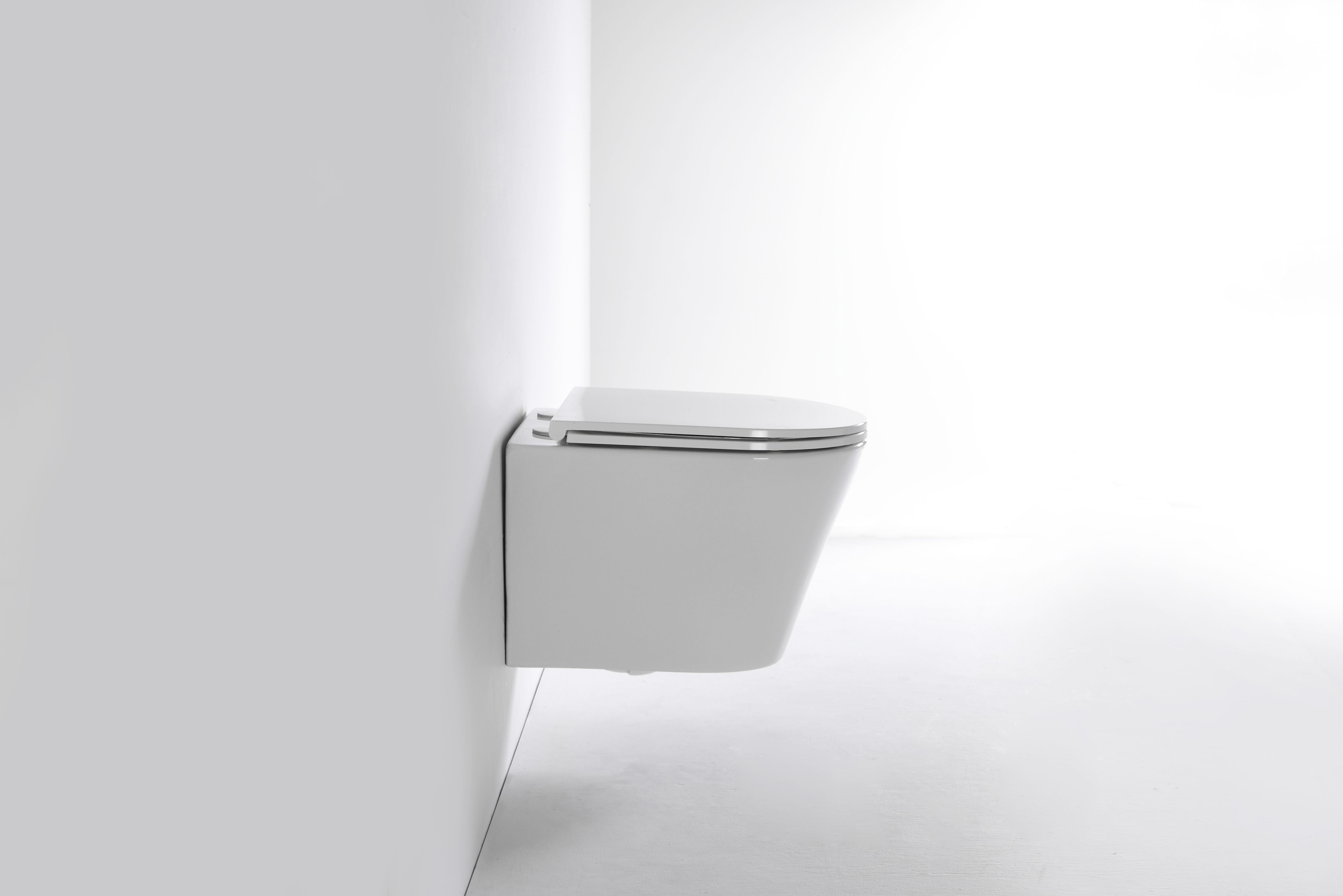 Minimalist White Wall Hung Toilet – Modern Design, Dual Flush, Eco-Friendly