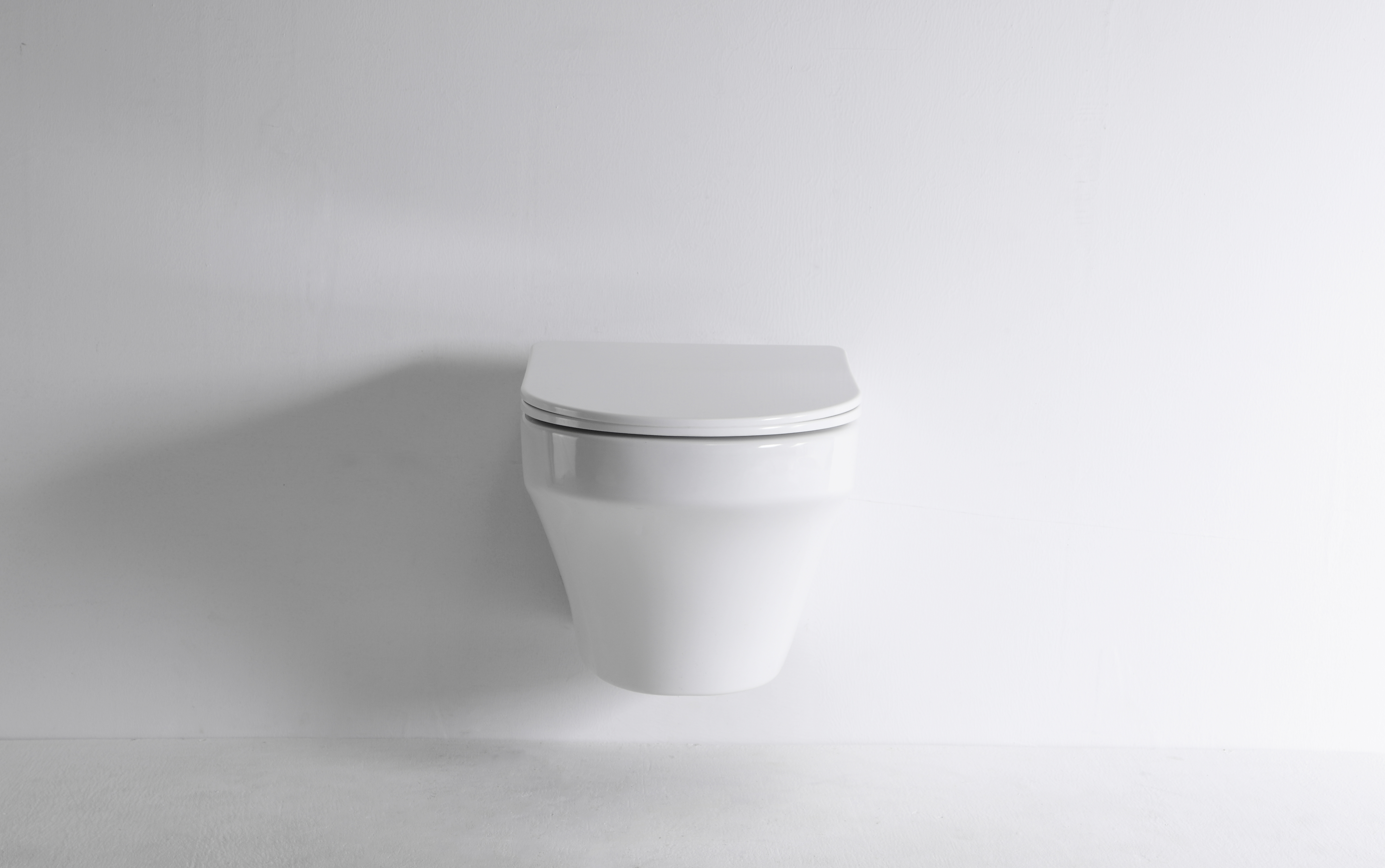 Modern Minimalist Wall Hung Toilet with Soft Close Seat – Space Saving Ceramic WC