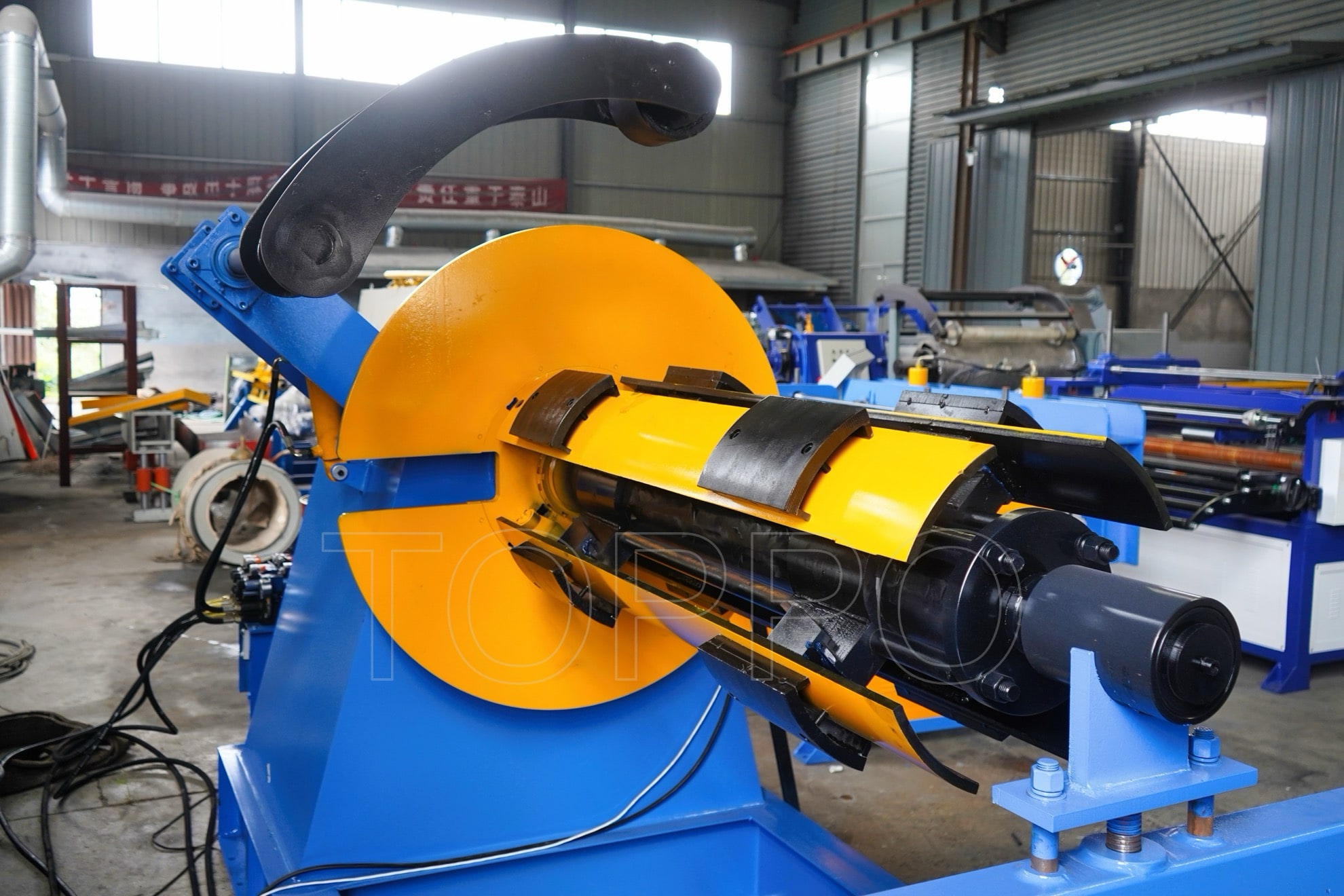 Industrial Decoiler with Hydraulic Coil Car, Pressing Arm, Support Arm & Rotating Disc
