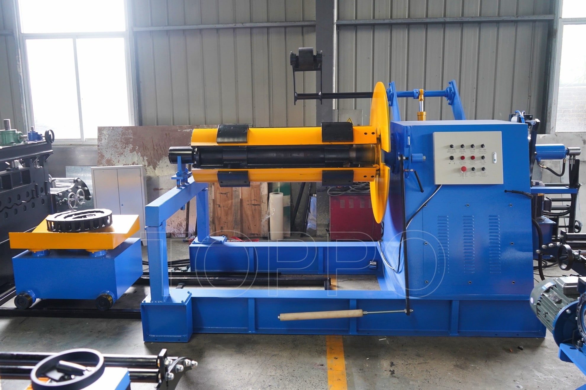 Industrial Decoiler with Hydraulic Coil Car, Pressing Arm, Support Arm & Rotating Disc