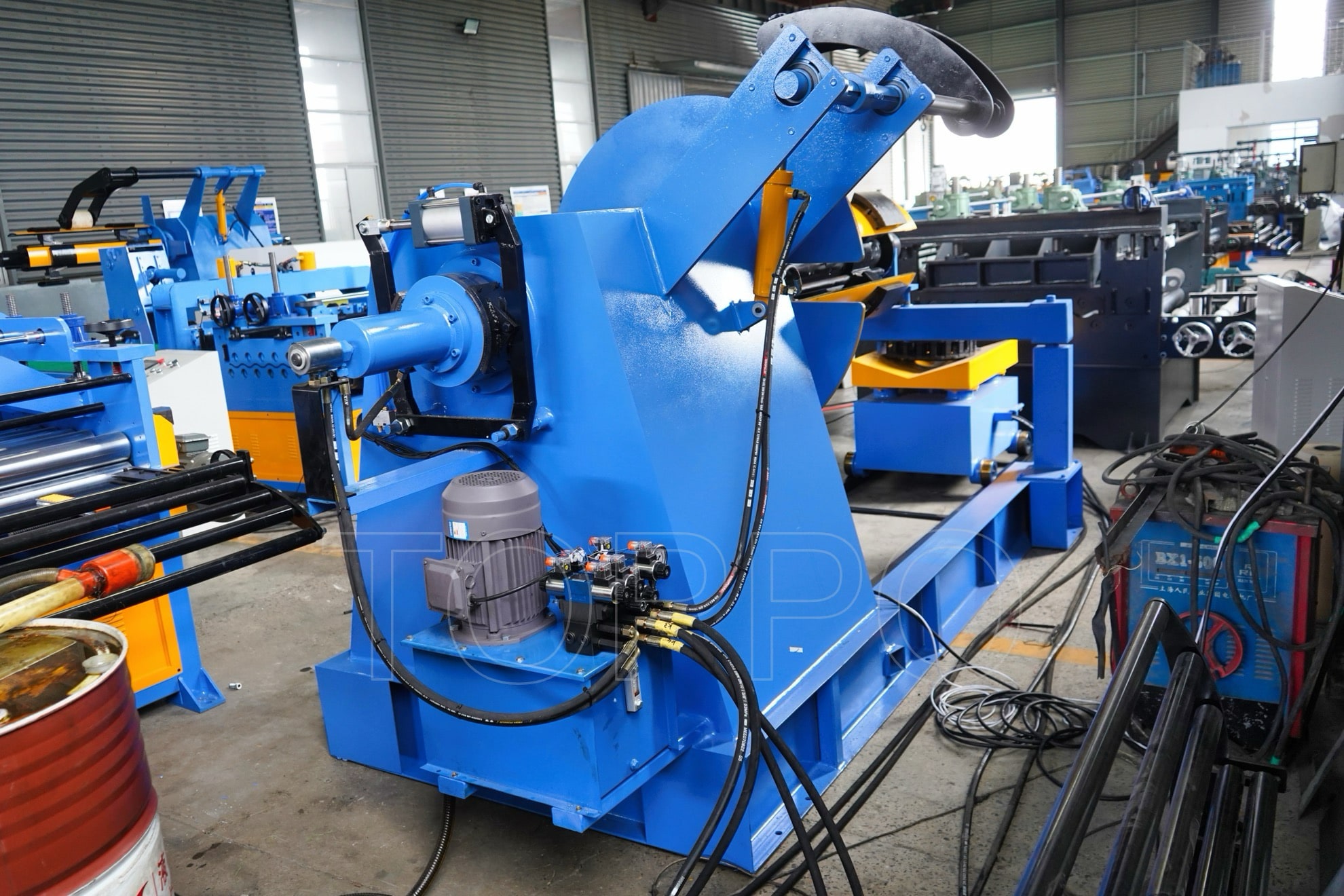 Industrial Decoiler with Hydraulic Coil Car, Pressing Arm, Support Arm & Rotating Disc