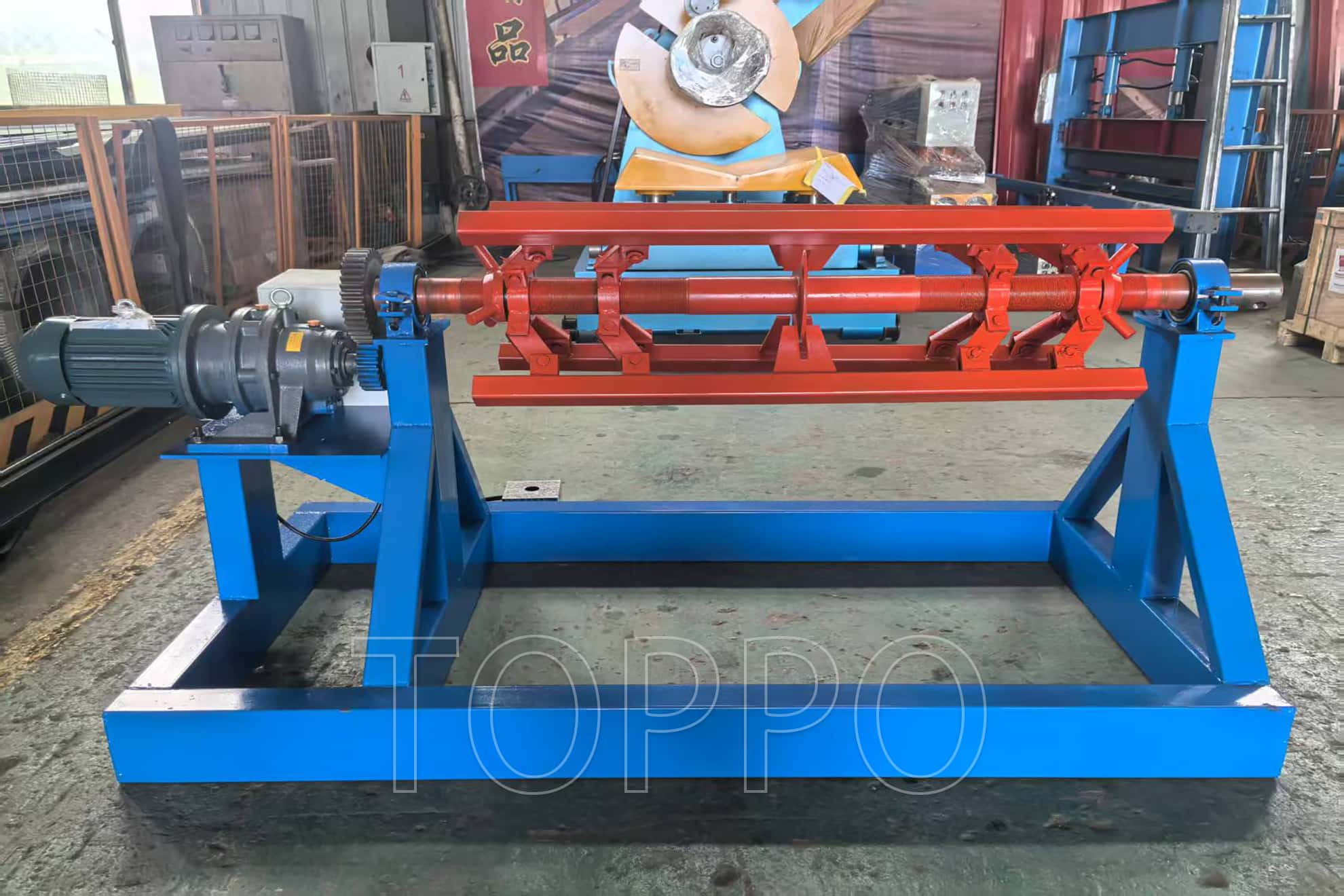 Electric Decoiler with Red Expansion Arm and Control Panel
