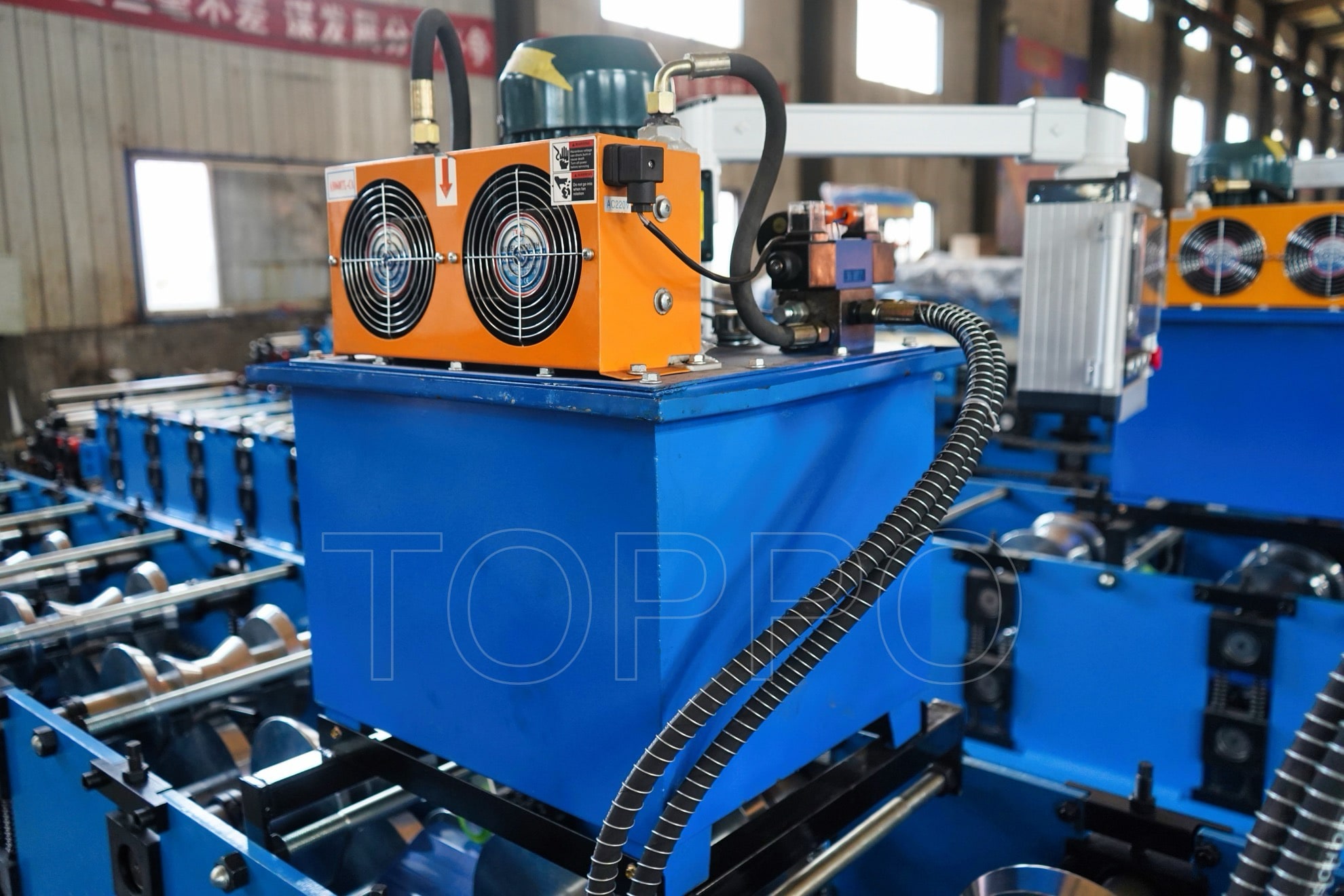 Compact Ridge Cap Roll Forming Machine with Vertical Output
